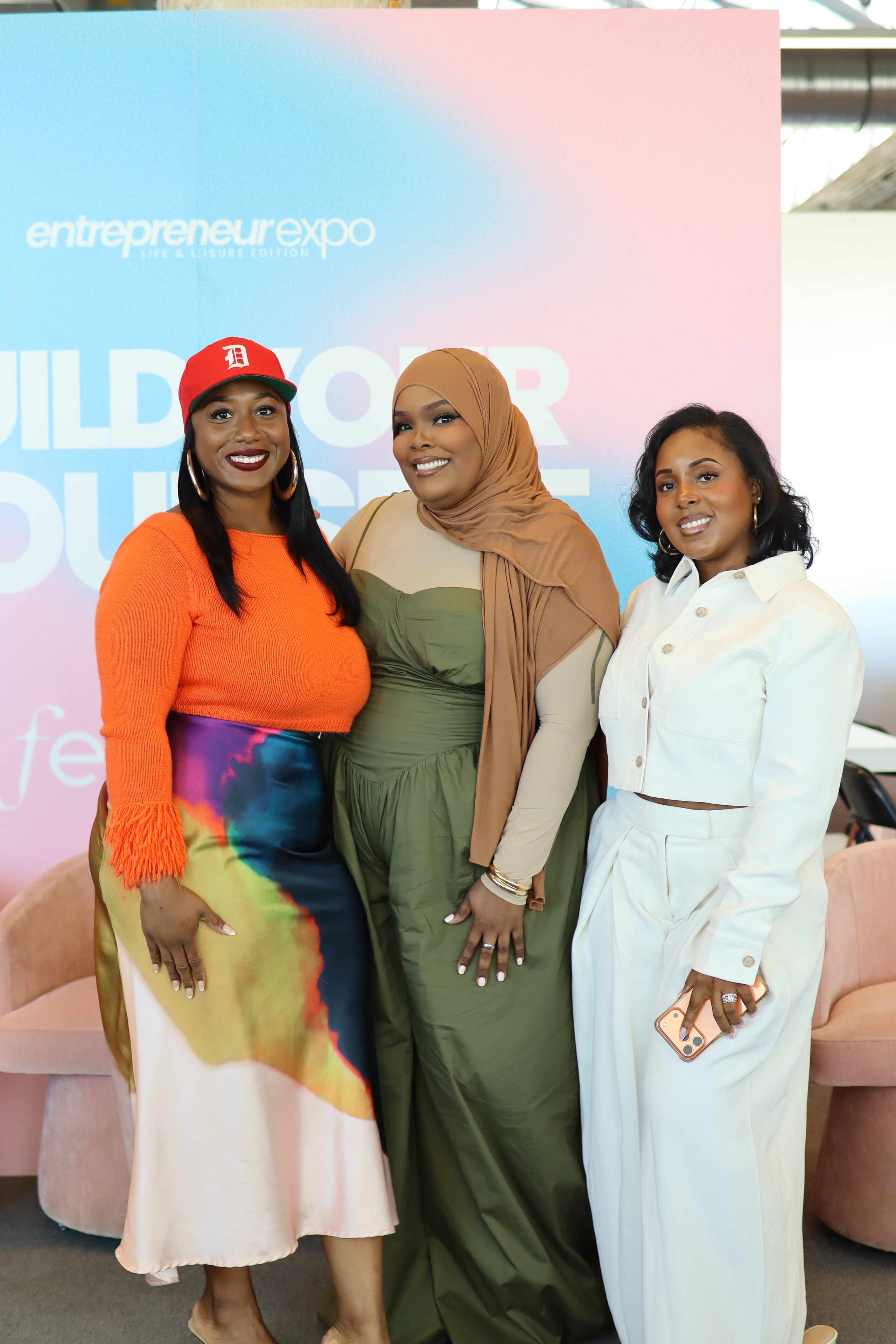 Three women posing at Femology Entrepreneur Expo
